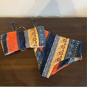 Size small multi pattern, tie, two piece swimsuit